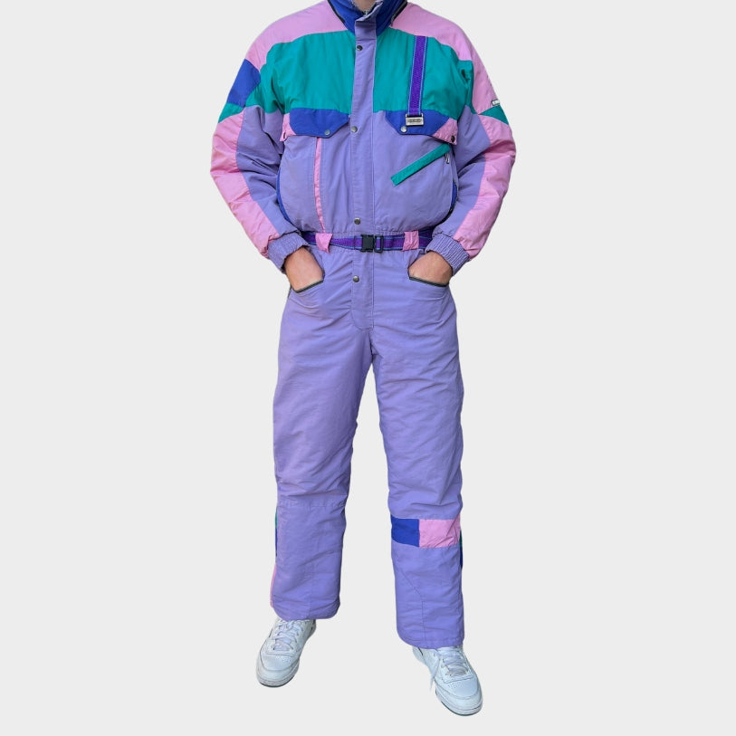 Vintage retro skisuit, ski-pak en skioverall jaren '80/'90, felgekleurde retro après-ski outfit voor carnaval 🎭, foute feestoutfit 🎿 en wintersport bij Retroskipakken.nl