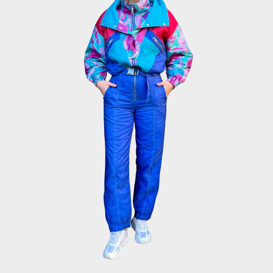 Vintage retro skisuit, ski-pak en skioverall jaren '80/'90, felgekleurde retro après-ski outfit voor carnaval 🎭, foute feestoutfit 🎿 en wintersport bij Retroskipakken.nl