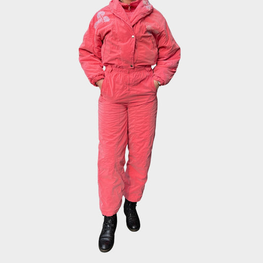 Vintage retro skisuit, ski-pak en skioverall jaren '80/'90, felgekleurde retro après-ski outfit voor carnaval 🎭, foute feestoutfit 🎿 en wintersport bij Retroskipakken.nl