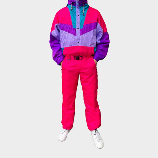 Vintage retro skisuit, ski-pak en skioverall jaren '80/'90, felgekleurde retro après-ski outfit voor carnaval 🎭, foute feestoutfit 🎿 en wintersport bij Retroskipakken.nl