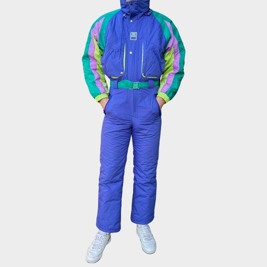 Vintage retro skisuit, ski-pak en skioverall jaren '80/'90, felgekleurde retro après-ski outfit voor carnaval 🎭, foute feestoutfit 🎿 en wintersport bij Retroskipakken.nl