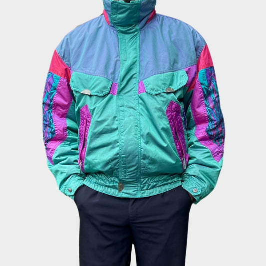 Vintage retro ski-jack, ski-jas en jaren '80/'90, felgekleurde retro après-ski outfit voor carnaval 🎭, foute feestoutfit 🎿 en wintersport bij Retroskipakken.nl