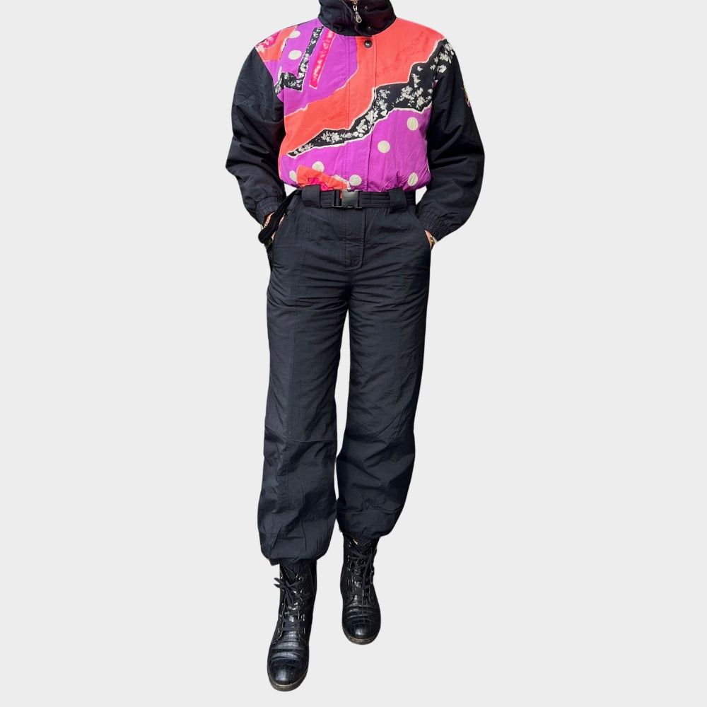 Vintage retro skisuit, ski-pak en skioverall jaren '80/'90, felgekleurde retro après-ski outfit voor carnaval 🎭, foute feestoutfit 🎿 en wintersport bij Retroskipakken.nl