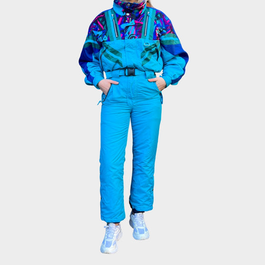 Vintage retro skisuit, ski-pak en skioverall jaren '80/'90, felgekleurde retro après-ski outfit voor carnaval 🎭, foute feestoutfit 🎿 en wintersport bij Retroskipakken.nl