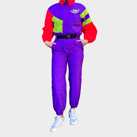 Vintage retro skisuit, ski-pak en skioverall jaren '80/'90, felgekleurde retro après-ski outfit voor carnaval 🎭, foute feestoutfit 🎿 en wintersport bij Retroskipakken.nl