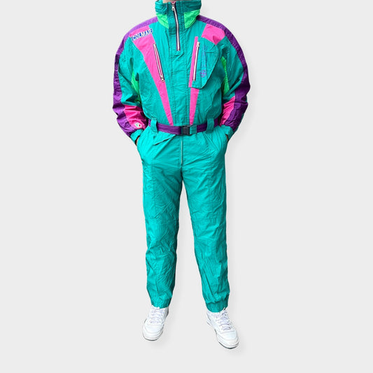 Vintage retro skisuit, ski-pak en skioverall jaren '80/'90, felgekleurde retro après-ski outfit voor carnaval 🎭, foute feestoutfit 🎿 en wintersport bij Retroskipakken.nl