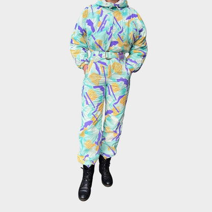 Vintage retro skisuit, ski-pak en skioverall jaren '80/'90, felgekleurde retro après-ski outfit voor carnaval 🎭, foute feestoutfit 🎿 en wintersport bij Retroskipakken.nl