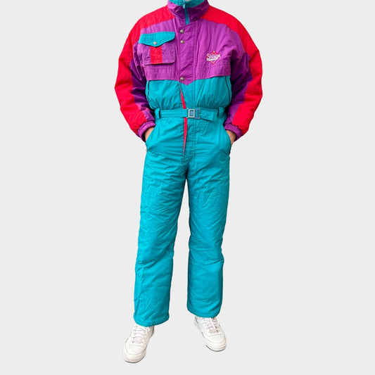 Vintage retro skisuit, ski-pak en skioverall jaren '80/'90, felgekleurde retro après-ski outfit voor carnaval 🎭, foute feestoutfit 🎿 en wintersport bij Retroskipakken.nl