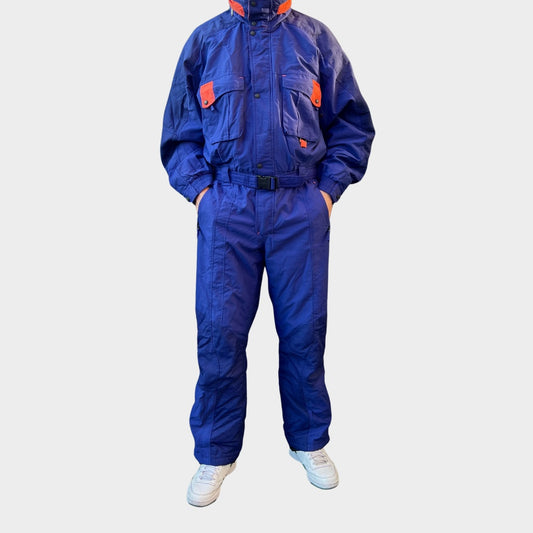Vintage retro skisuit, ski-pak en skioverall jaren '80/'90, felgekleurde retro après-ski outfit voor carnaval 🎭, foute feestoutfit 🎿 en wintersport bij Retroskipakken.nl
