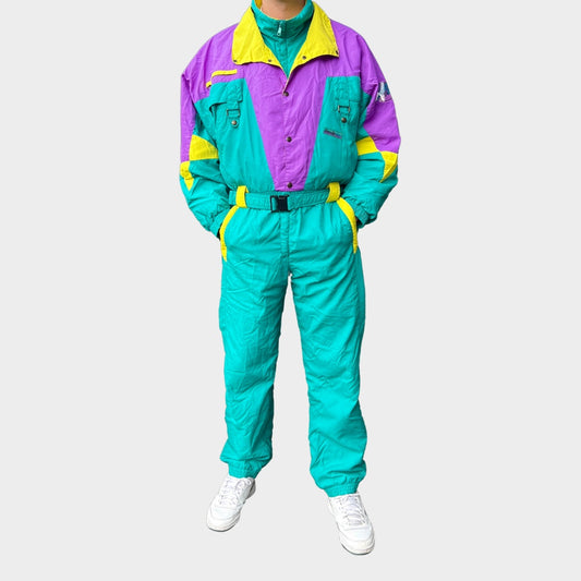 Vintage retro skisuit, ski-pak en skioverall jaren '80/'90, felgekleurde retro après-ski outfit voor carnaval 🎭, foute feestoutfit 🎿 en wintersport bij Retroskipakken.nl