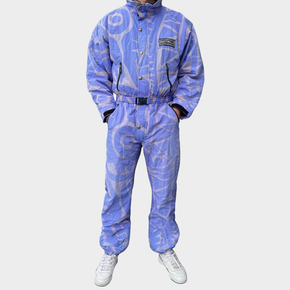 Vintage retro skisuit, ski-pak en skioverall jaren '80/'90, felgekleurde retro après-ski outfit voor carnaval 🎭, foute feestoutfit 🎿 en wintersport bij Retroskipakken.nl