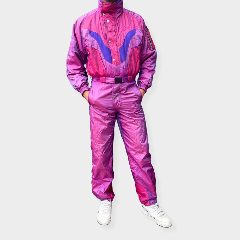 Vintage retro skisuit, ski-pak en skioverall jaren '80/'90, felgekleurde retro après-ski outfit voor carnaval 🎭, foute feestoutfit 🎿 en wintersport bij Retroskipakken.nl