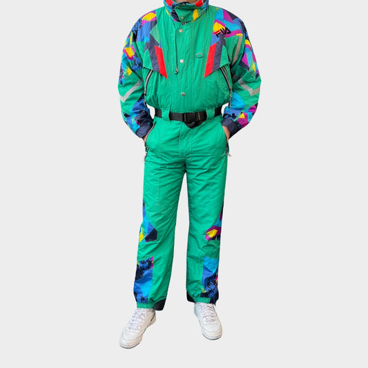 Vintage retro skisuit, ski-pak en skioverall jaren '80/'90, felgekleurde retro après-ski outfit voor carnaval 🎭, foute feestoutfit 🎿 en wintersport bij Retroskipakken.nl