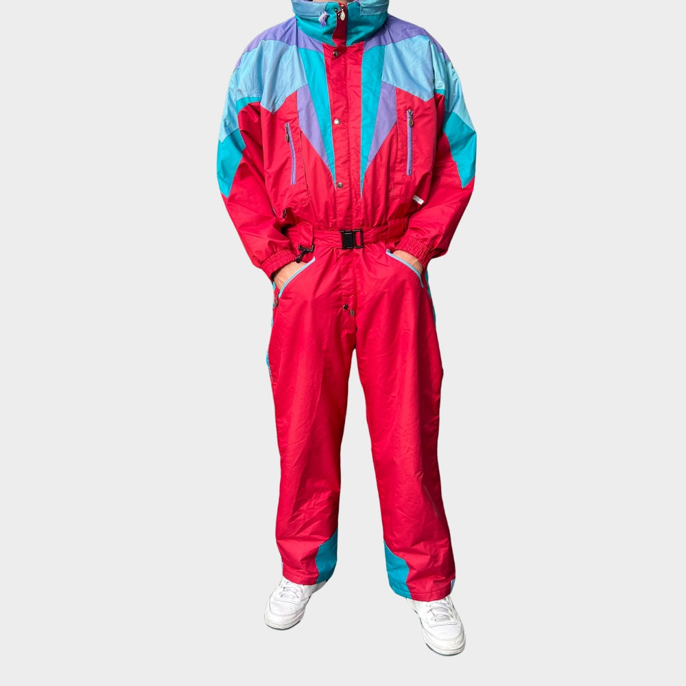 Vintage retro skisuit, ski-pak en skioverall jaren '80/'90, felgekleurde retro après-ski outfit voor carnaval 🎭, foute feestoutfit 🎿 en wintersport bij Retroskipakken.nl