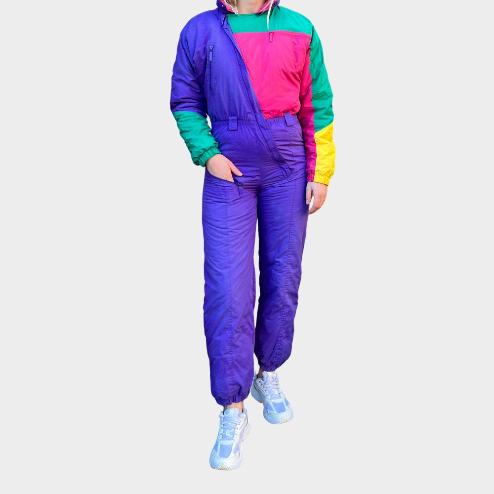 Vintage retro skisuit, ski-pak en skioverall jaren '80/'90, felgekleurde retro après-ski outfit voor carnaval 🎭, foute feestoutfit 🎿 en wintersport bij Retroskipakken.nl