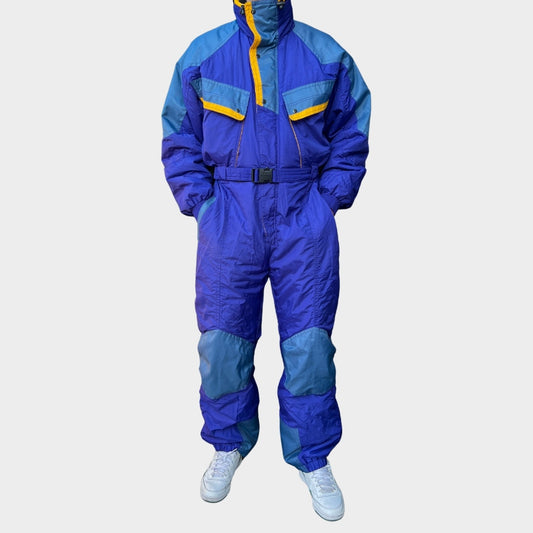 Vintage retro skisuit, ski-pak en skioverall jaren '80/'90, felgekleurde retro après-ski outfit voor carnaval 🎭, foute feestoutfit 🎿 en wintersport bij Retroskipakken.nl